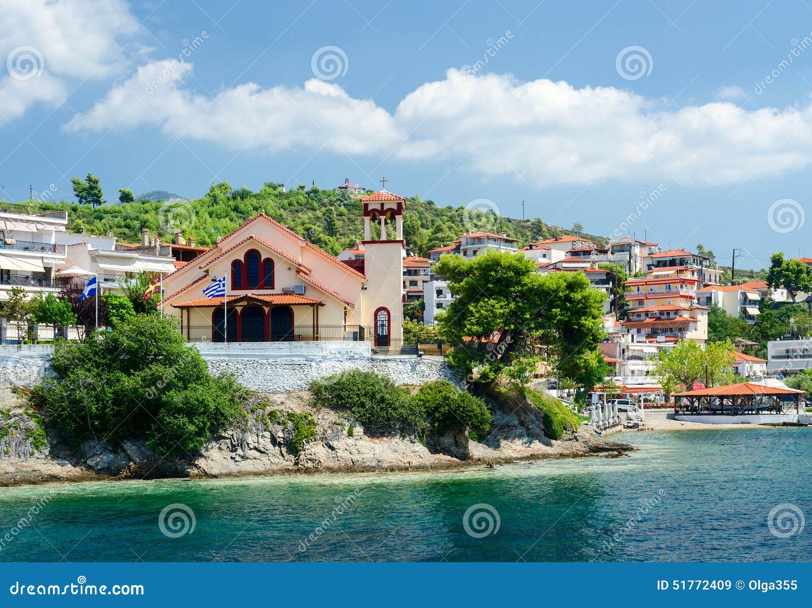 greece, sithonia, view of church on waterfront in neos marmaras