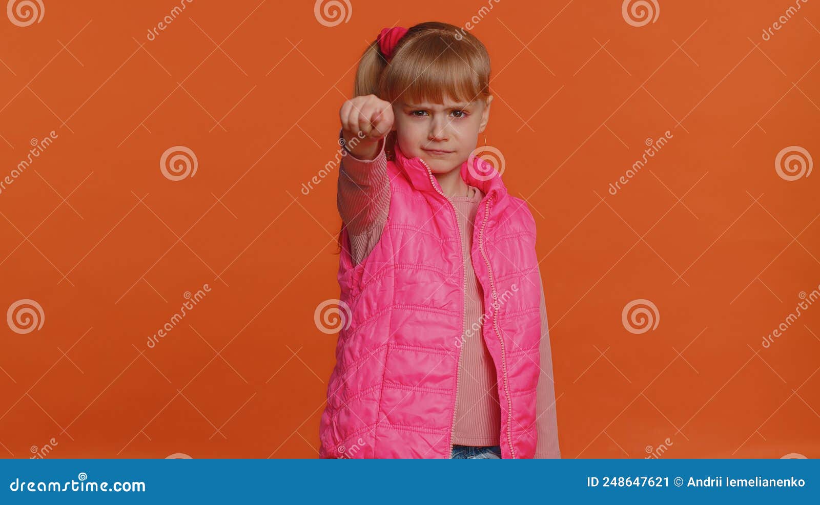 greedy aggressive children girl showing fig negative gesture, refusal fig sign, rapacious avaricious