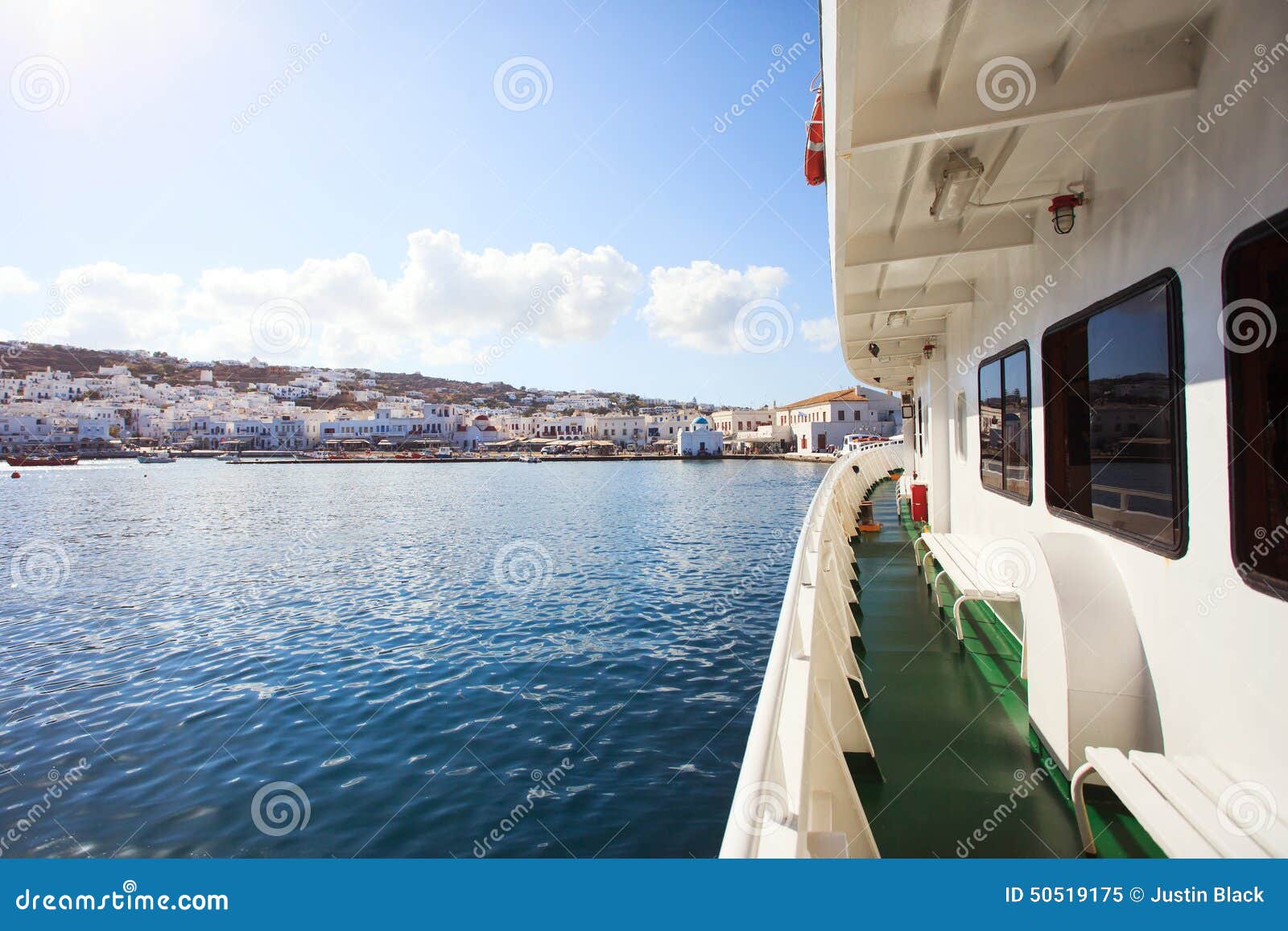 Greek Ferry with Mykonos View. View of Mykonos city from Greek ferry boat.