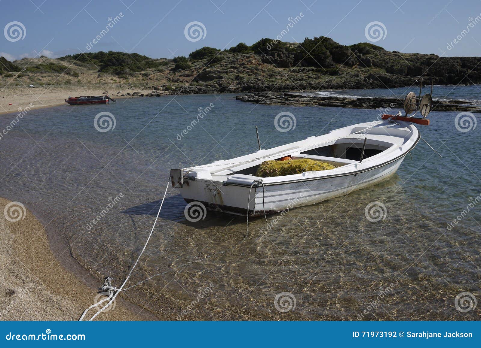 greek fishing boat in natural harbour stock photo - image