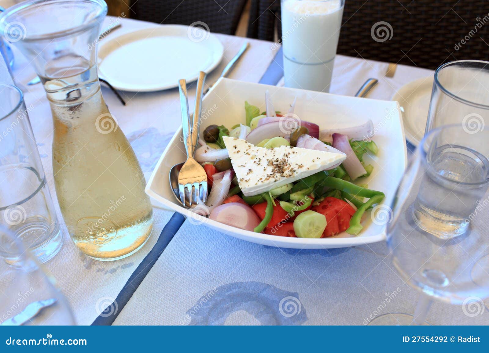 Greek salad and white wine stock photo. Image of dinner 27554292