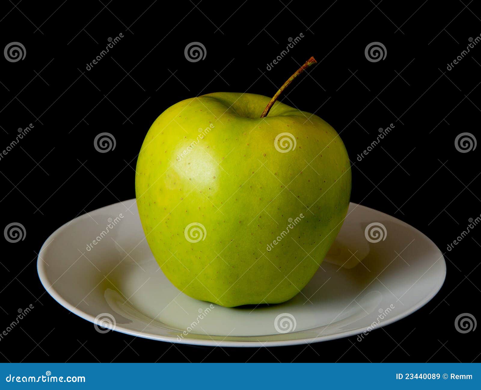 Green apple on a plate stock image. Image of health, white - 23440089