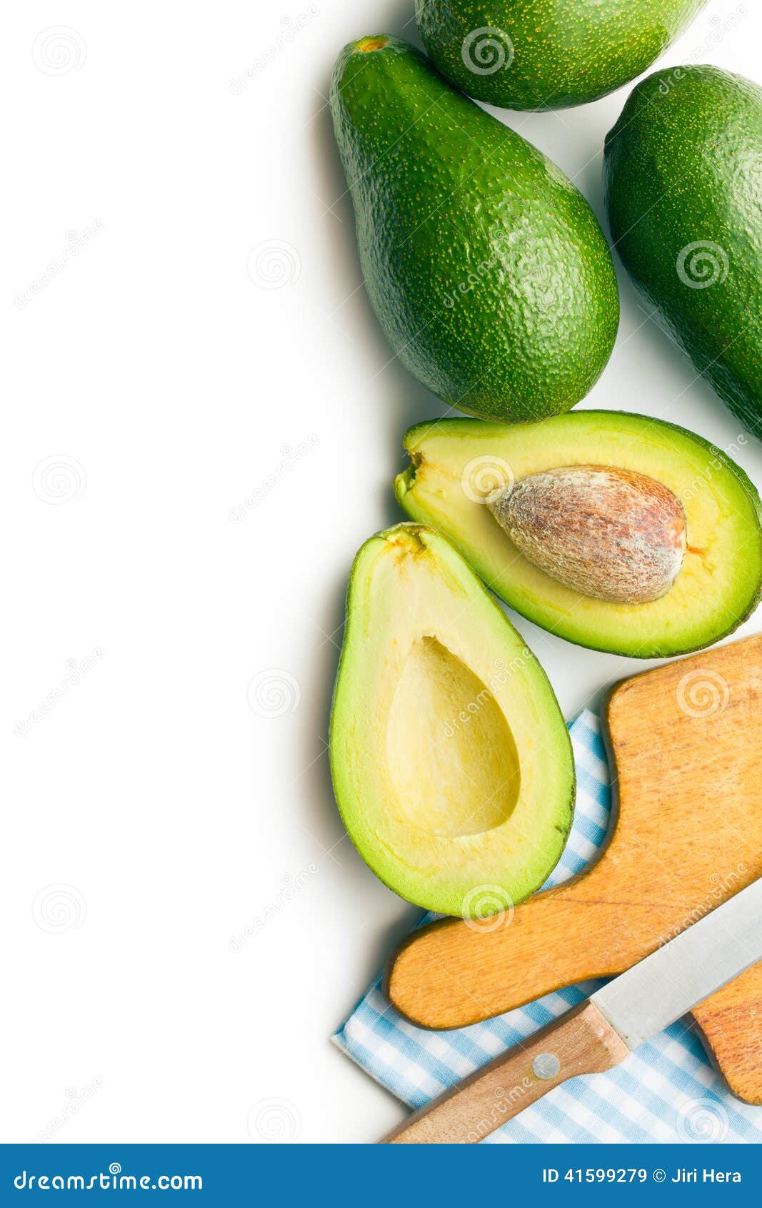 Chopped Avocados In A Bowl On Cutting Board On Wooden Background. Half  Avocado With Pulp And Seed, Whole Green Fresh Tropical Fruit On Brown  Table, Top View Stock Photo, Picture and Royalty