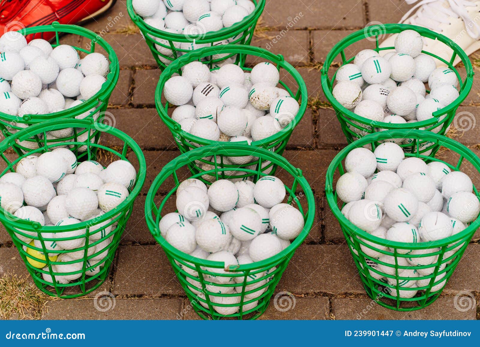 Green Baskets of Golf Balls. Accessories for the Game. Stock Image