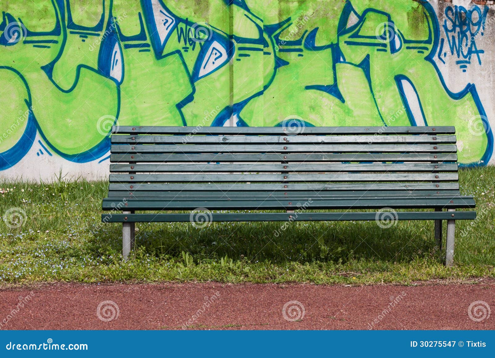 Green Bench With Graffiti On The Background Editorial Photography Image Of Graffiti