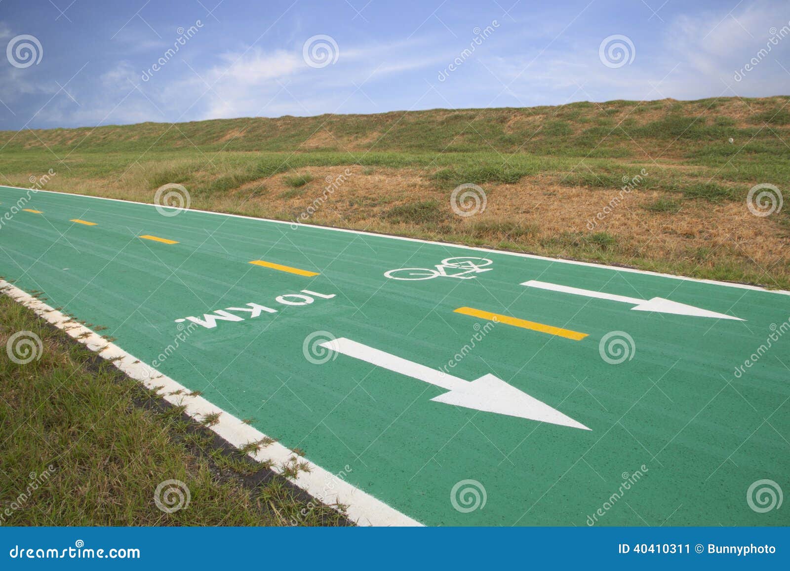 Green bicycle track stock image. Image of yellow, road 40410311