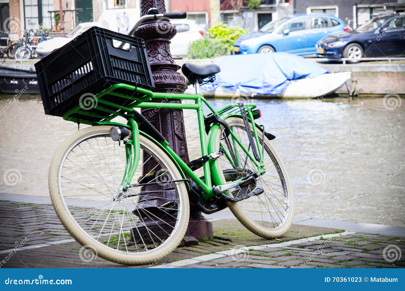 Green bike in Amsterdam stock image. Image of bike, transportation