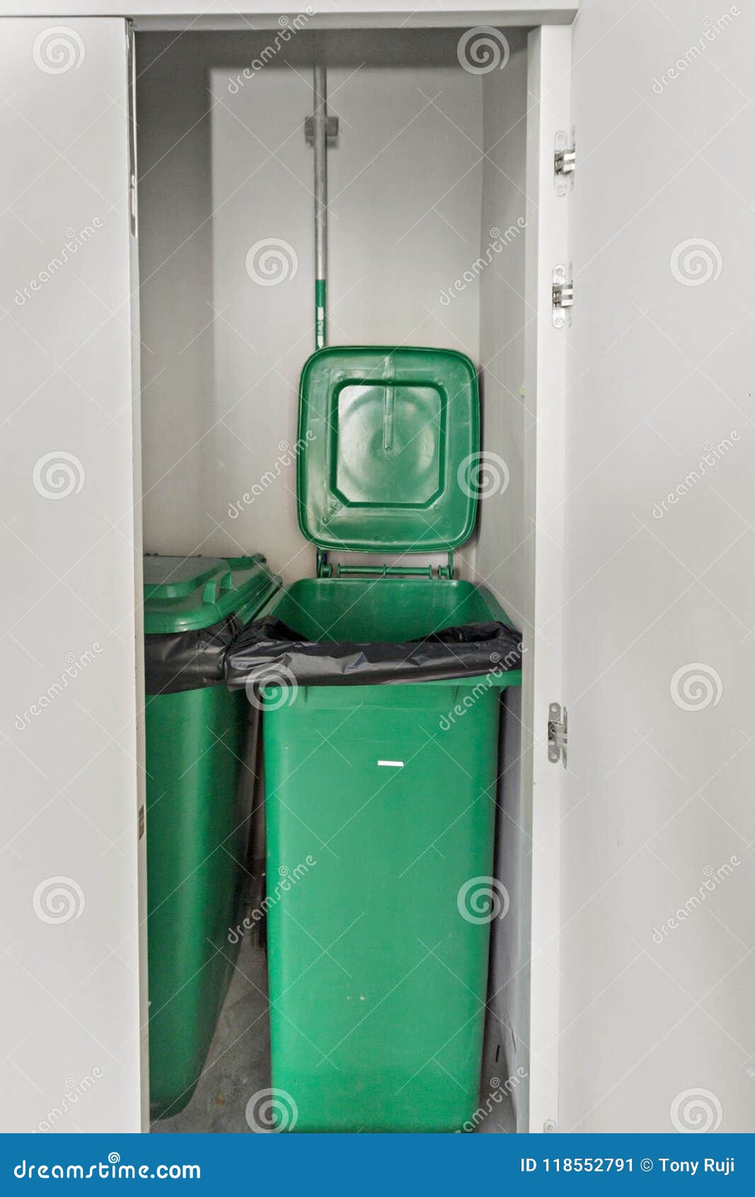 Green bin inside locker stock image. Image of blue, recycle 118552791