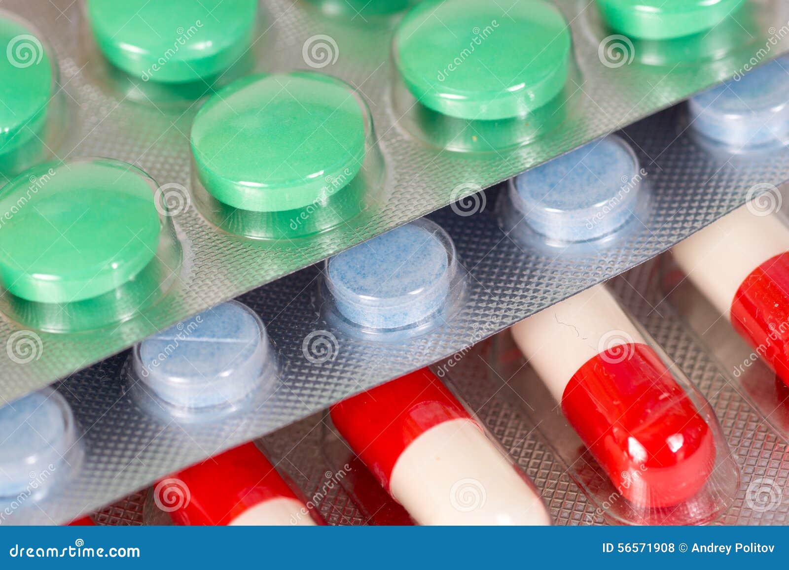 green blue and white and red antibiotic capsules stock apothecary plans