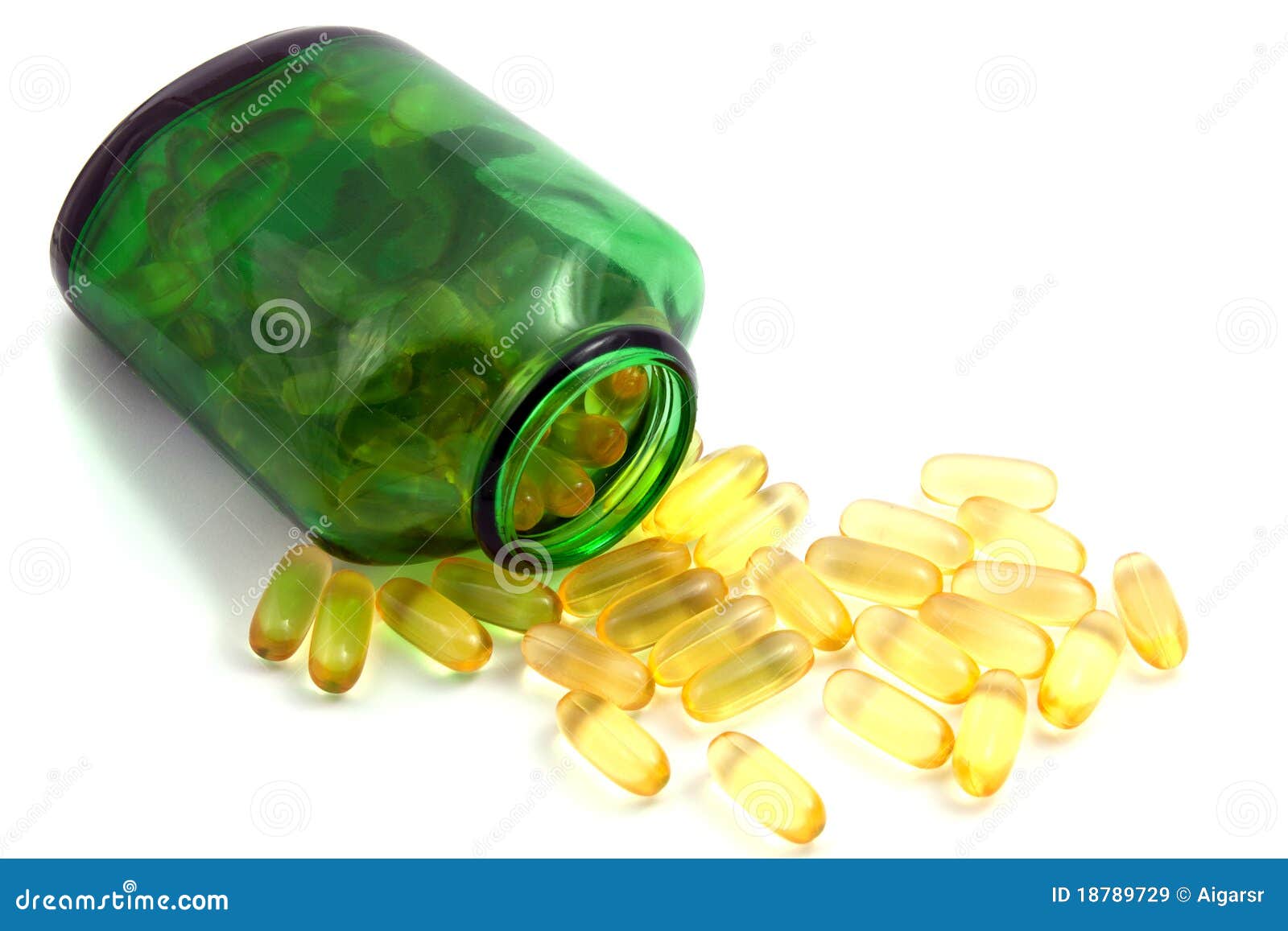 Green bottle and pills stock image. Image of illness 18789729