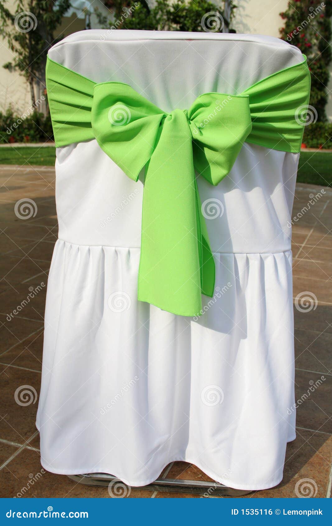 Green bow on a party chair stock photo. Image of engagement 1535116