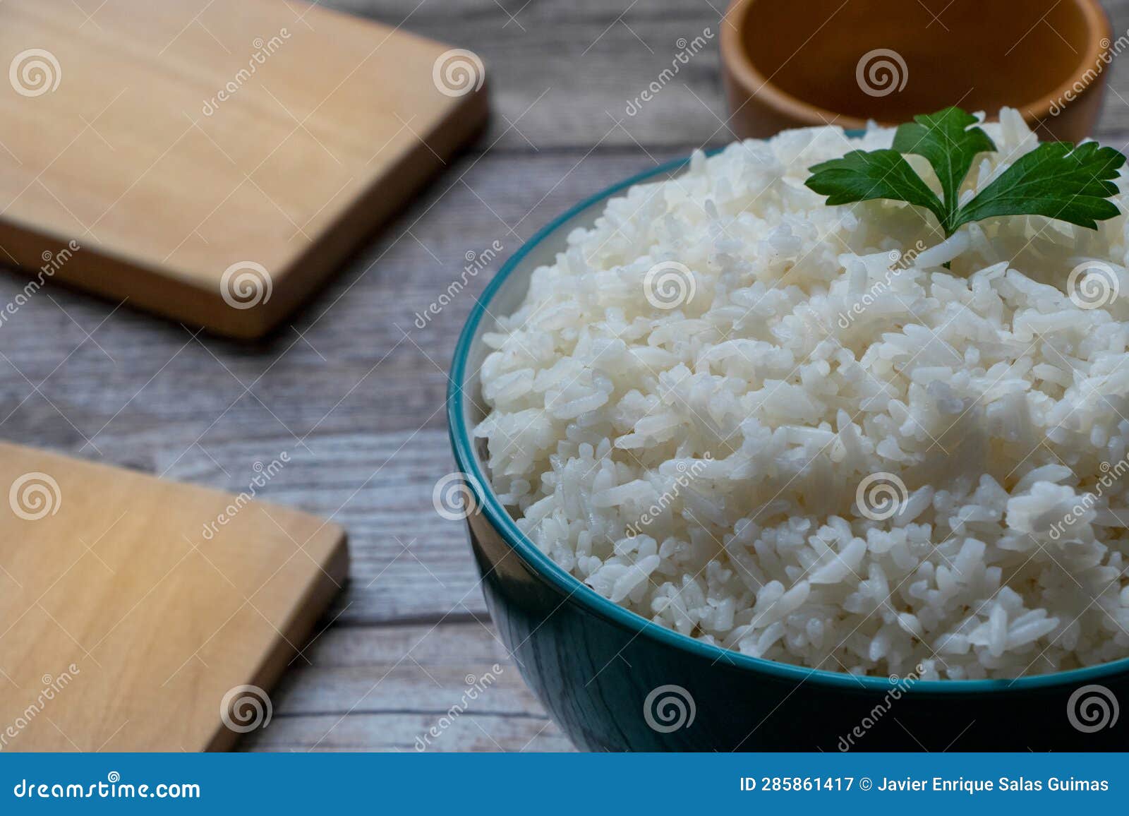 green bowl with white rice.