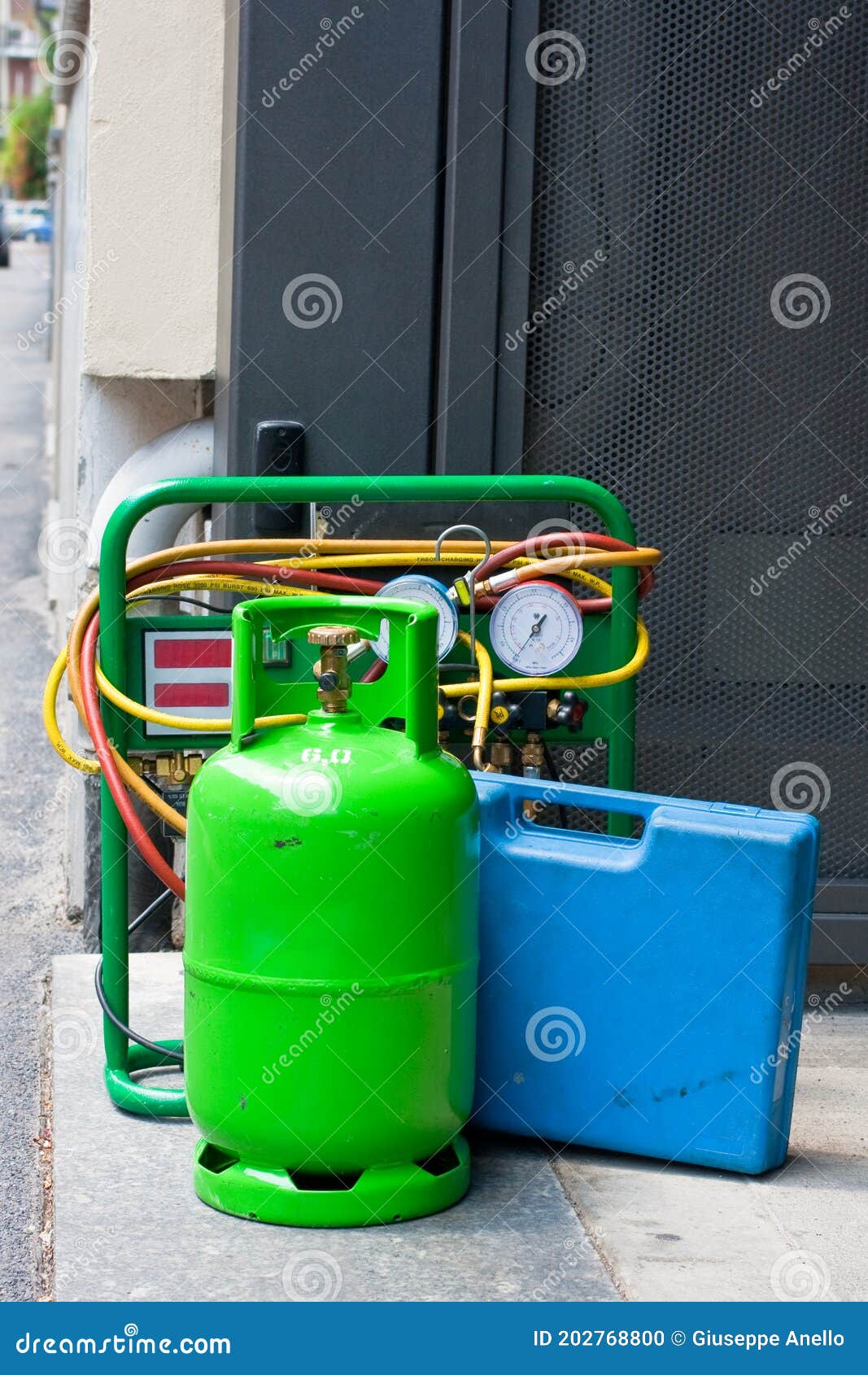 Green butane gas cylinder stock photo. Image of druck 202768800