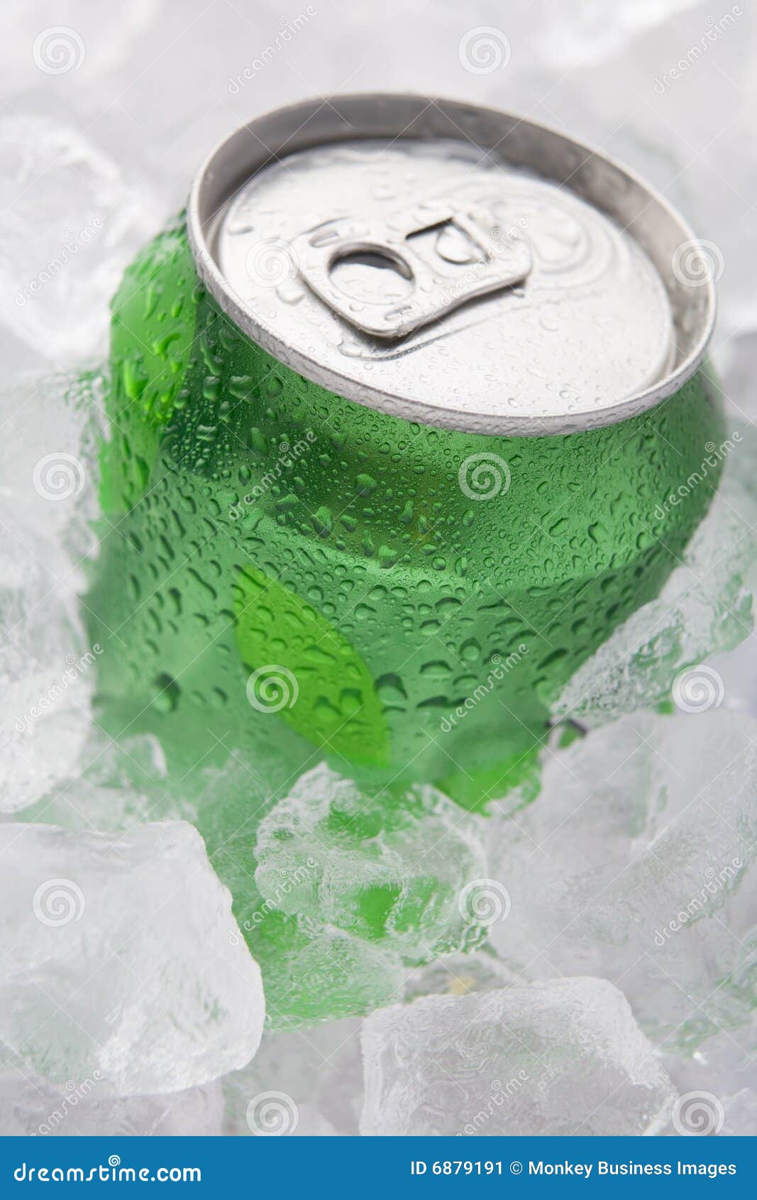 green can of fizzy soft drink set in ice