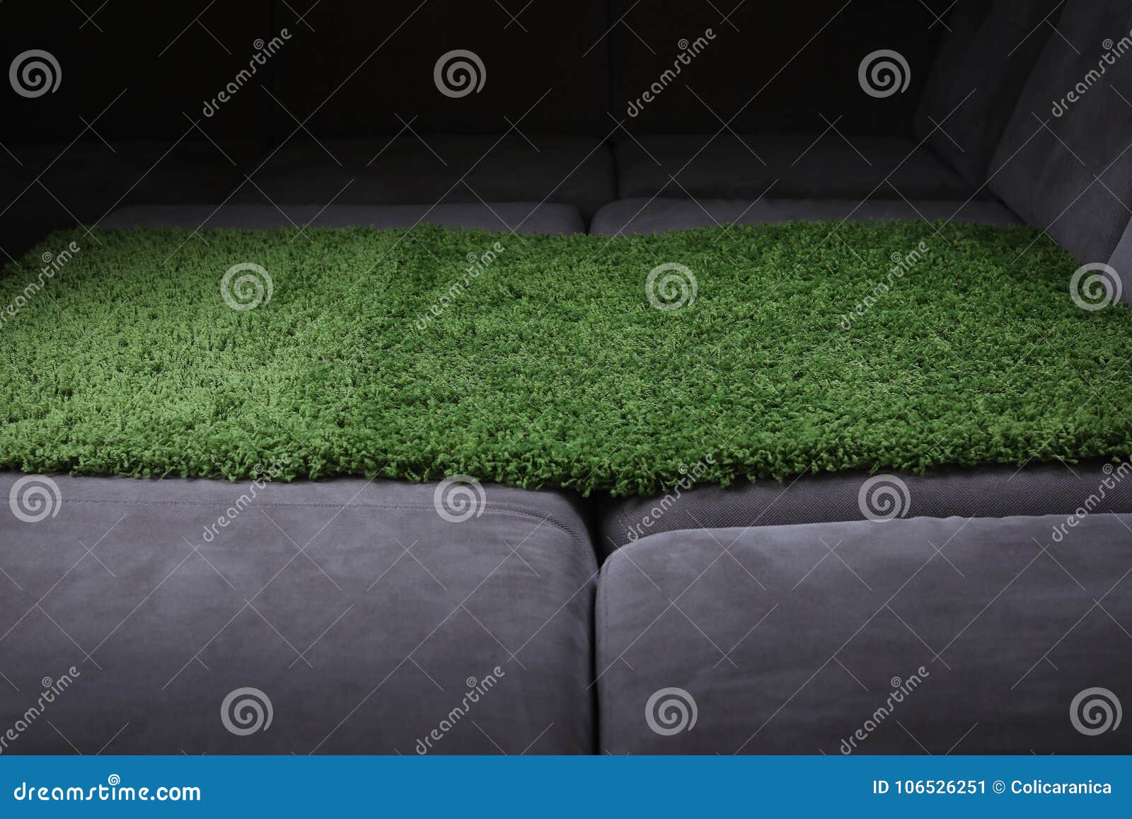 Green carpet on the couch stock image. Image of indoor 106526251