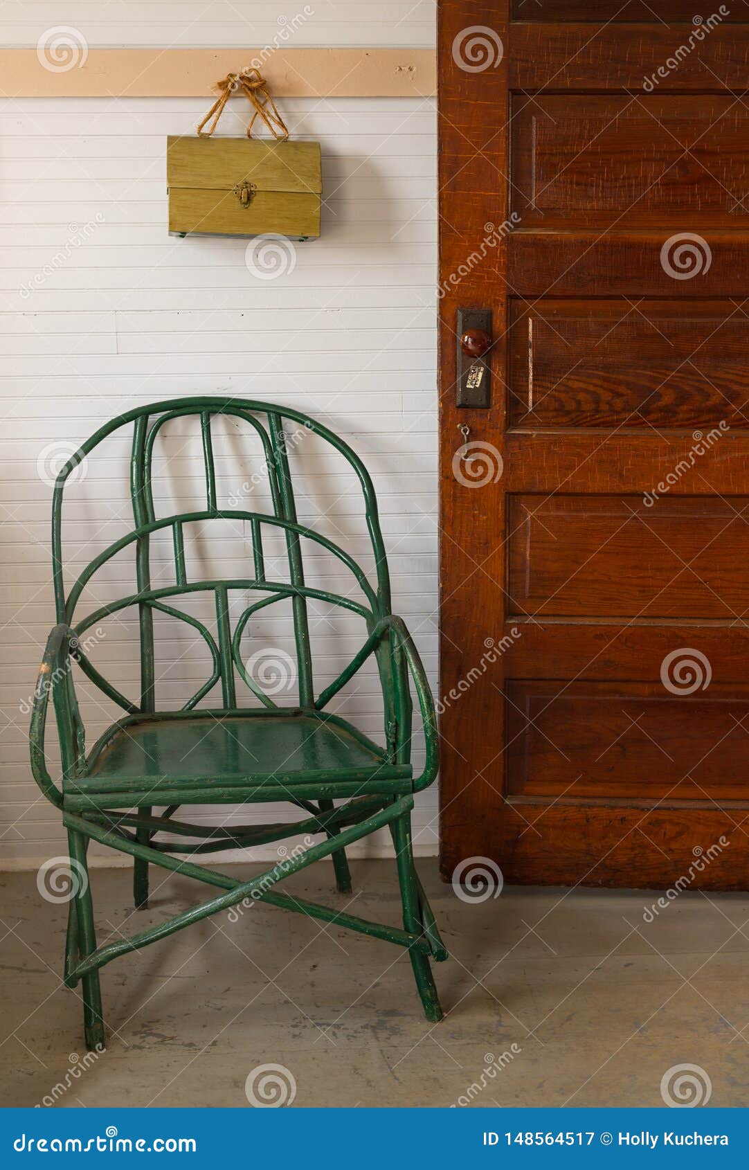 green chair at schoolroom entrance