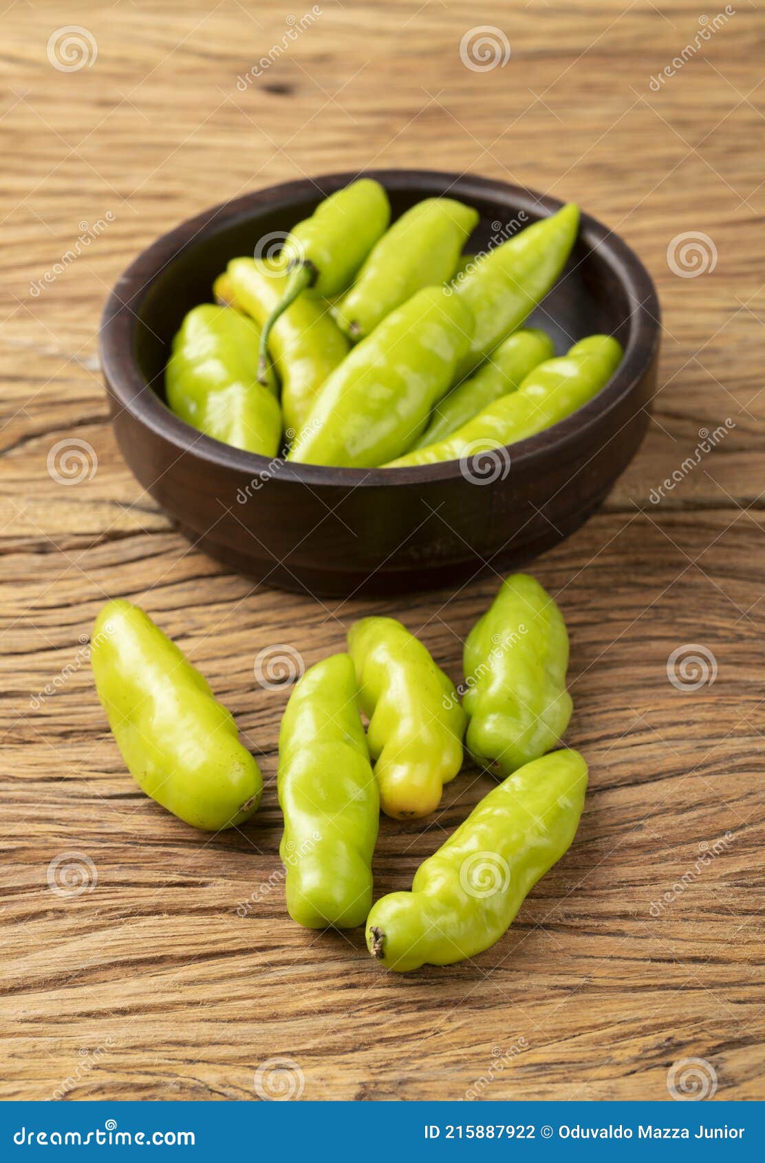 green cheiro scent/smell pepper on a bowl over wooden table