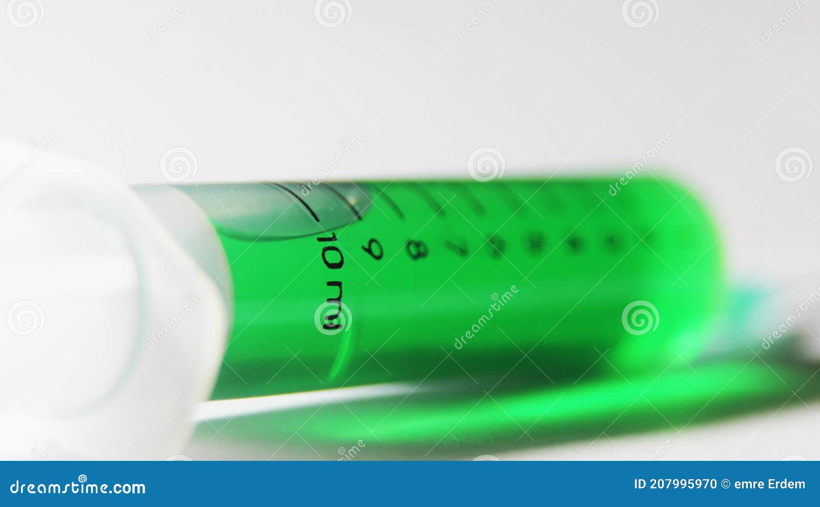 green chemical medicine in syringe. vaccine study