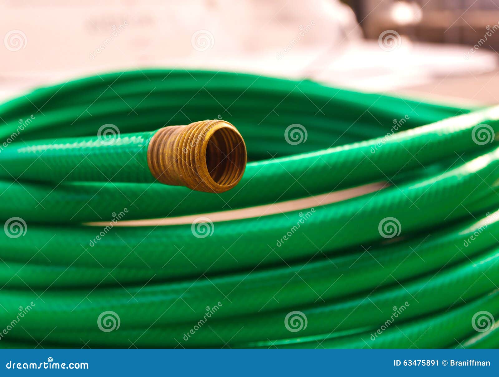 Green coiled rubber hose stock image. Image of growth 63475891