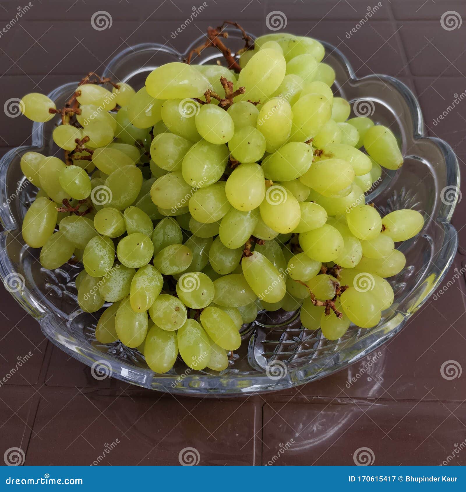 Green Coloured Grapes Kept in a Dish. Botanically Grapes are Berries