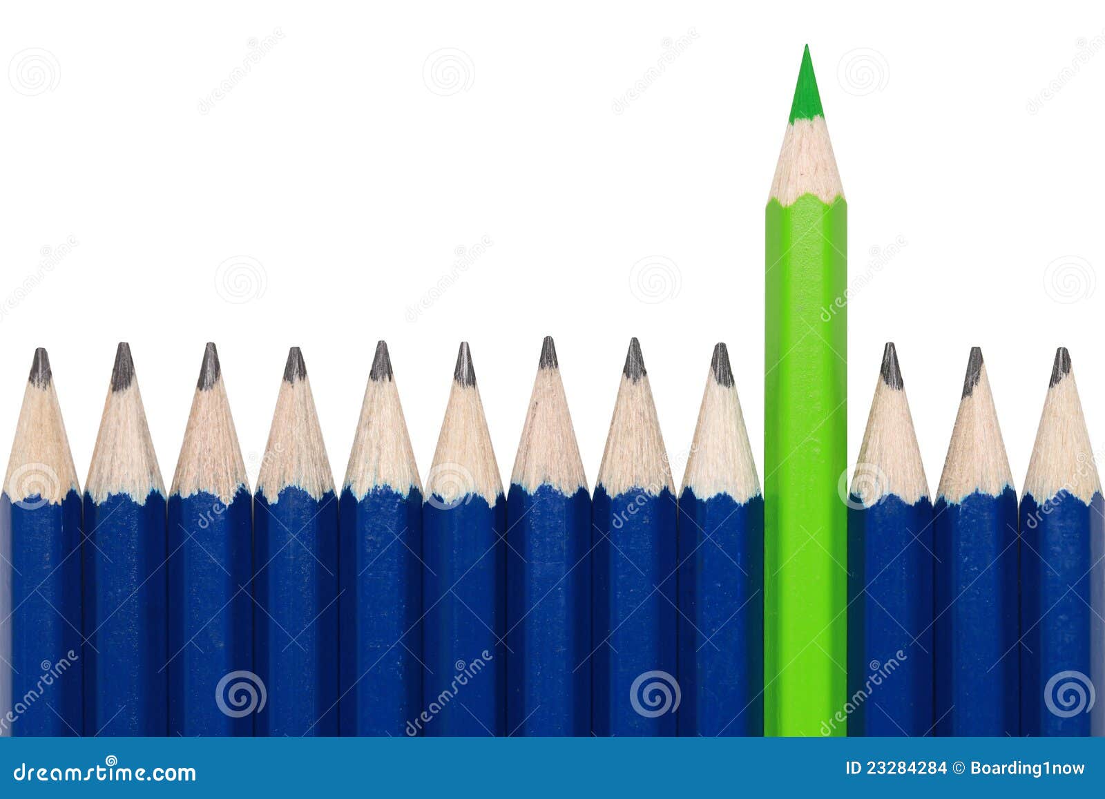 Green Crayon Standing Out From The Crowd Green Crayon Standing Out From The Crowd Stock Photo
