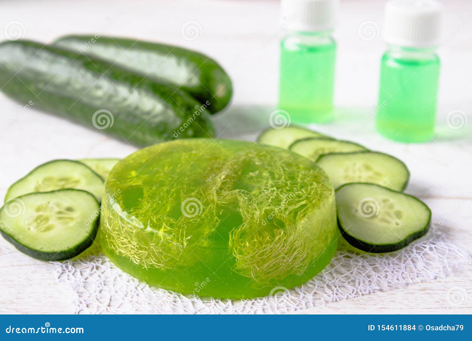 Green Cucumber Soap on a White Background with Cucumber Slices and