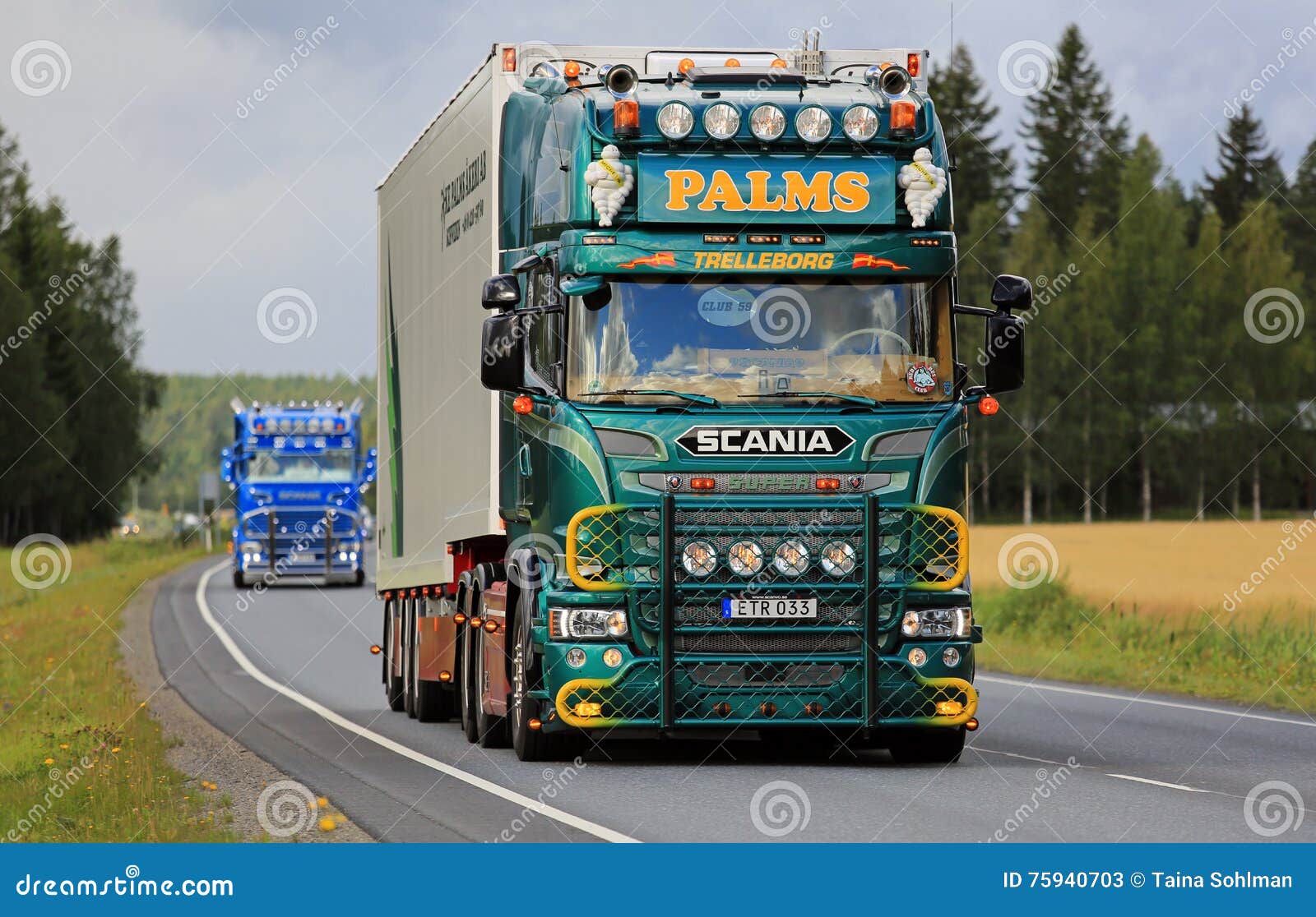 Green Customized Scania V8 Palms in Truck Convoy Editorial Stock