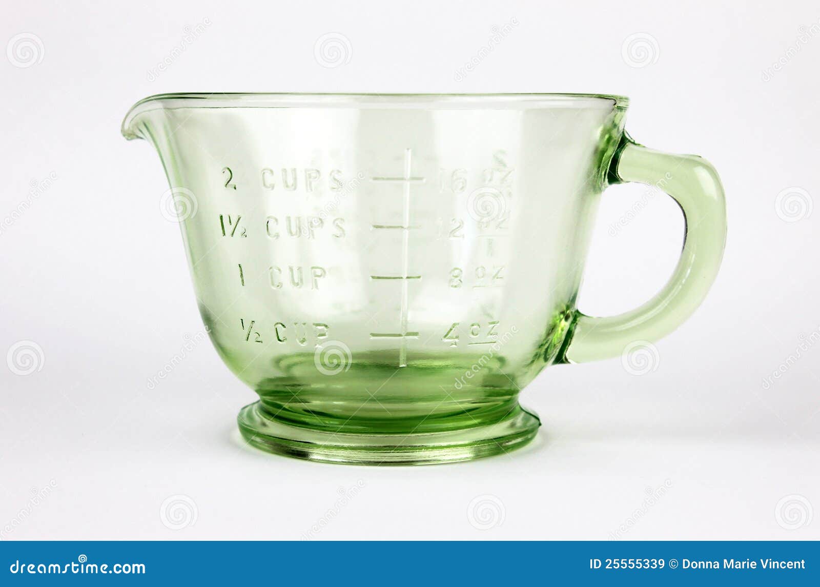 https://thumbs.dreamstime.com/z/green-depression-glass-measuring-cup-25555339.jpg