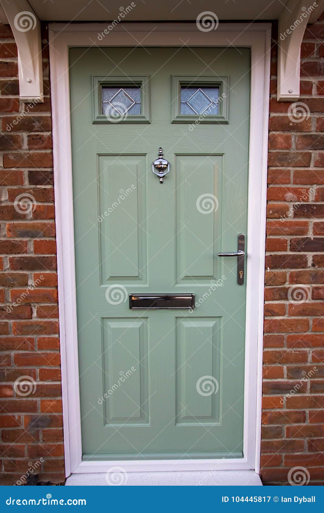 green door. modern house composite upvc front door