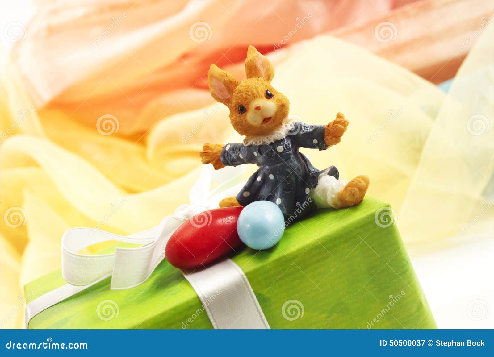 Green Easter Present with Ribbon, Easter Bunny Figure and Sugar Eggs