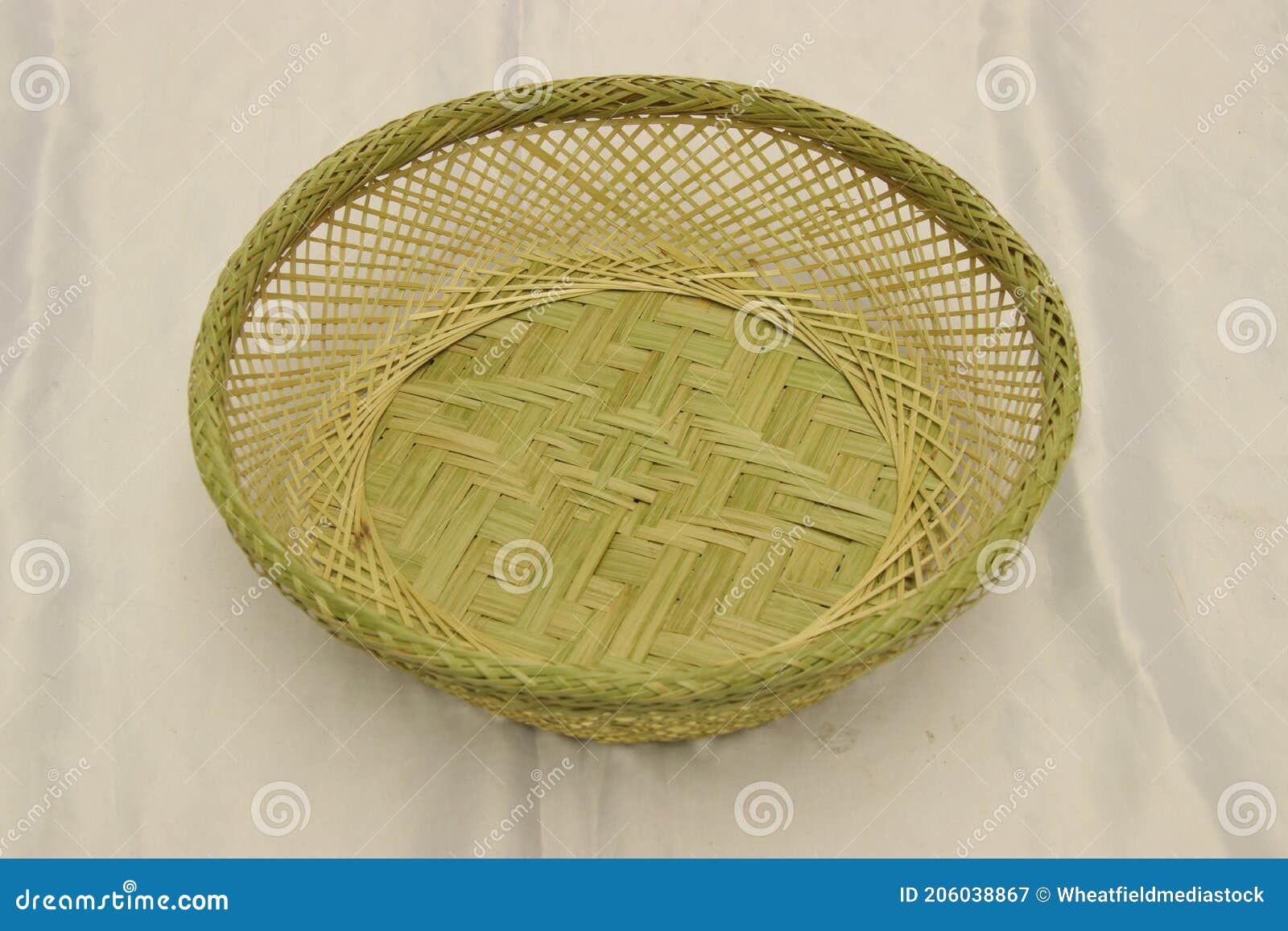 Green Empty Handmade Bamboo Basket Isolated. Bread Storage Container