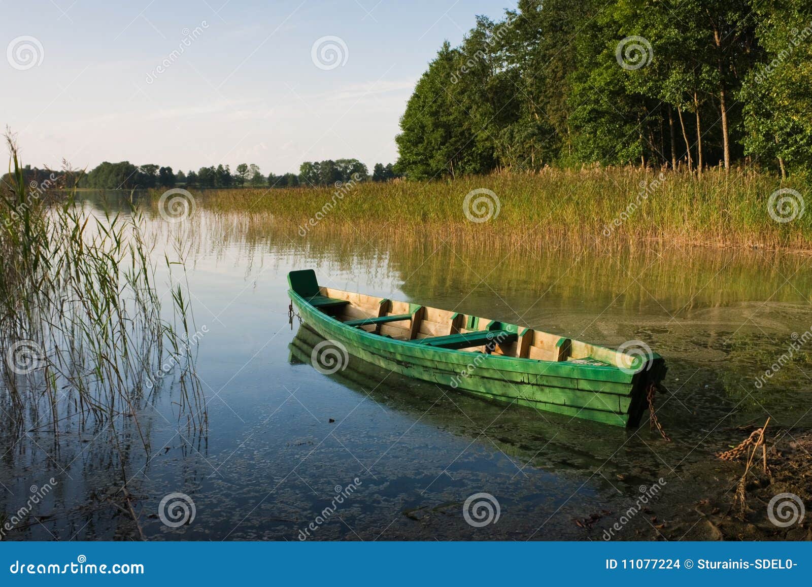 Green fishing boat stock photo. Image of reflection, water 11077224