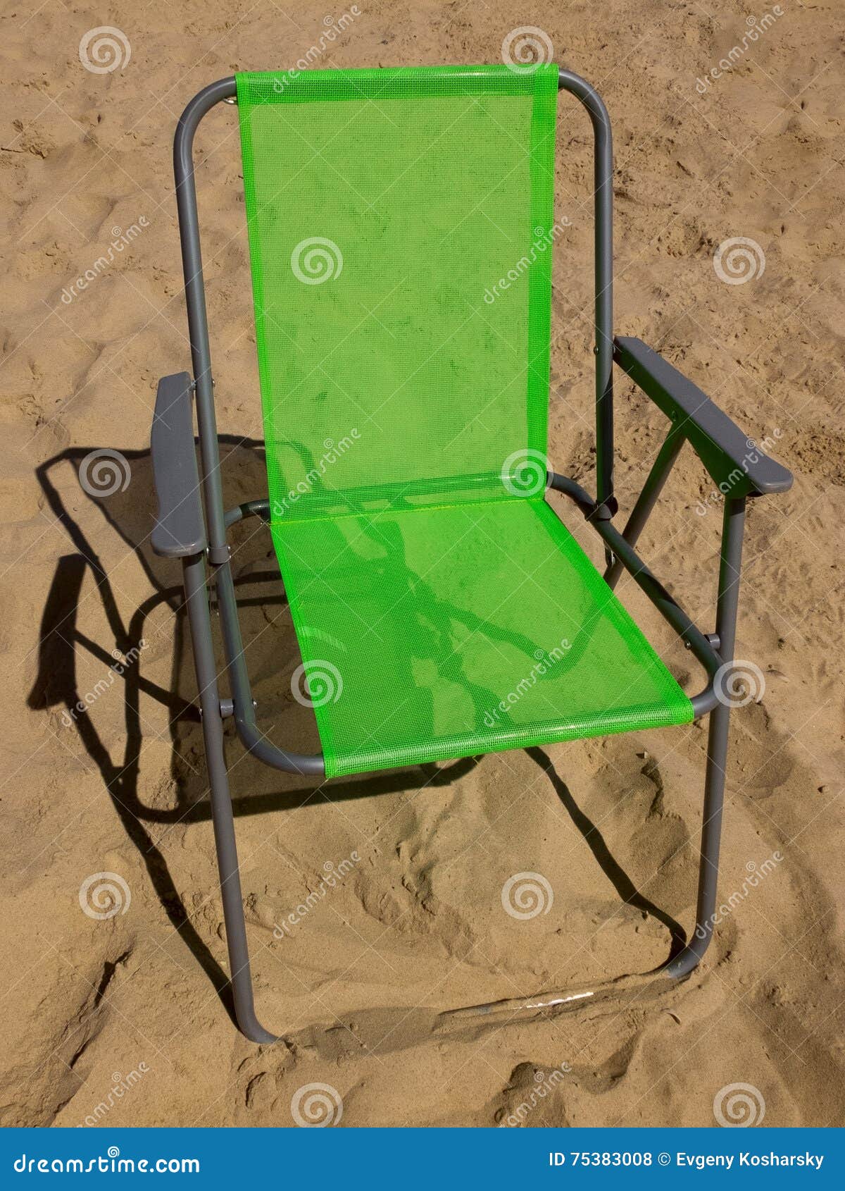 Green folding camp chair stock photo. Image of green 75383008