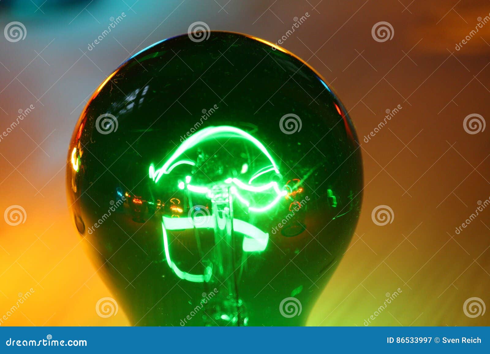 Green Glowing Bulb with Yellow Background Stock Image Image of