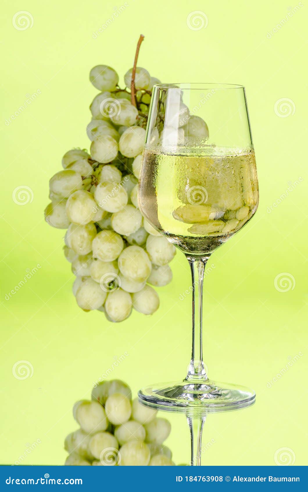 Green grapes and wine stock photo. Image of season, green 184763908