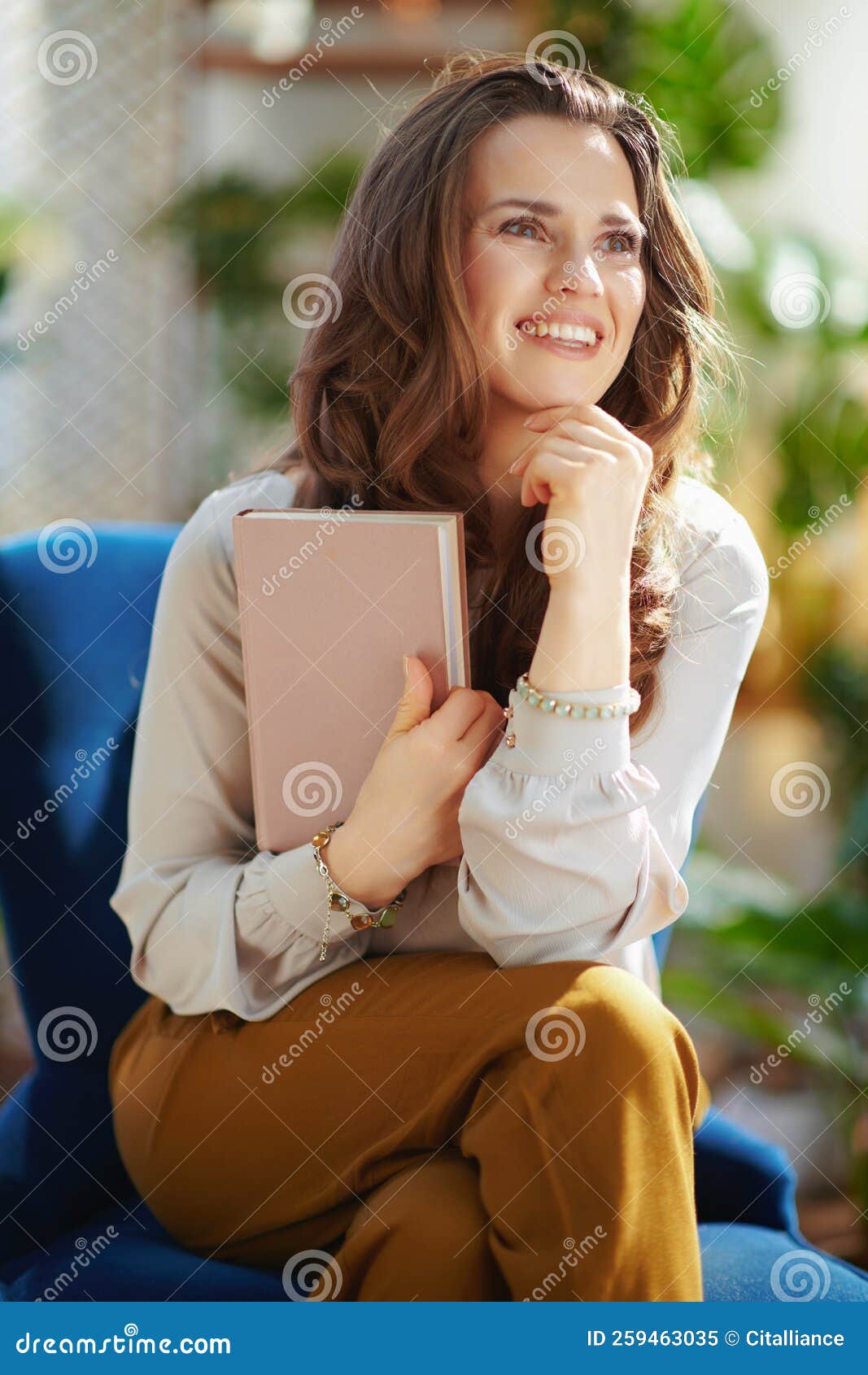 Smiling Woman With Long Wavy Hair In Living Room In Sunny Day Stock Image Image Of Haircut 