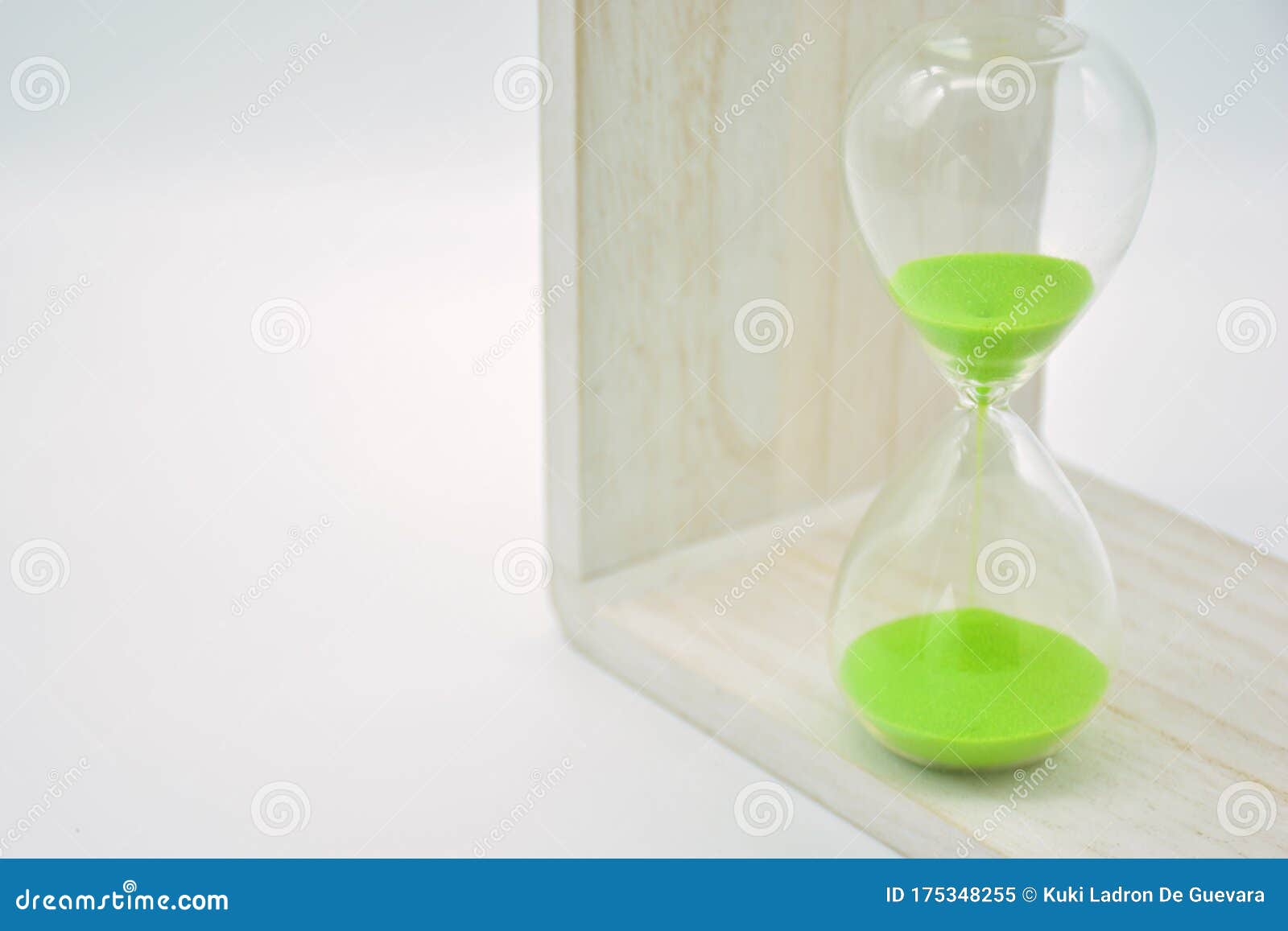 green hourglass, counting time