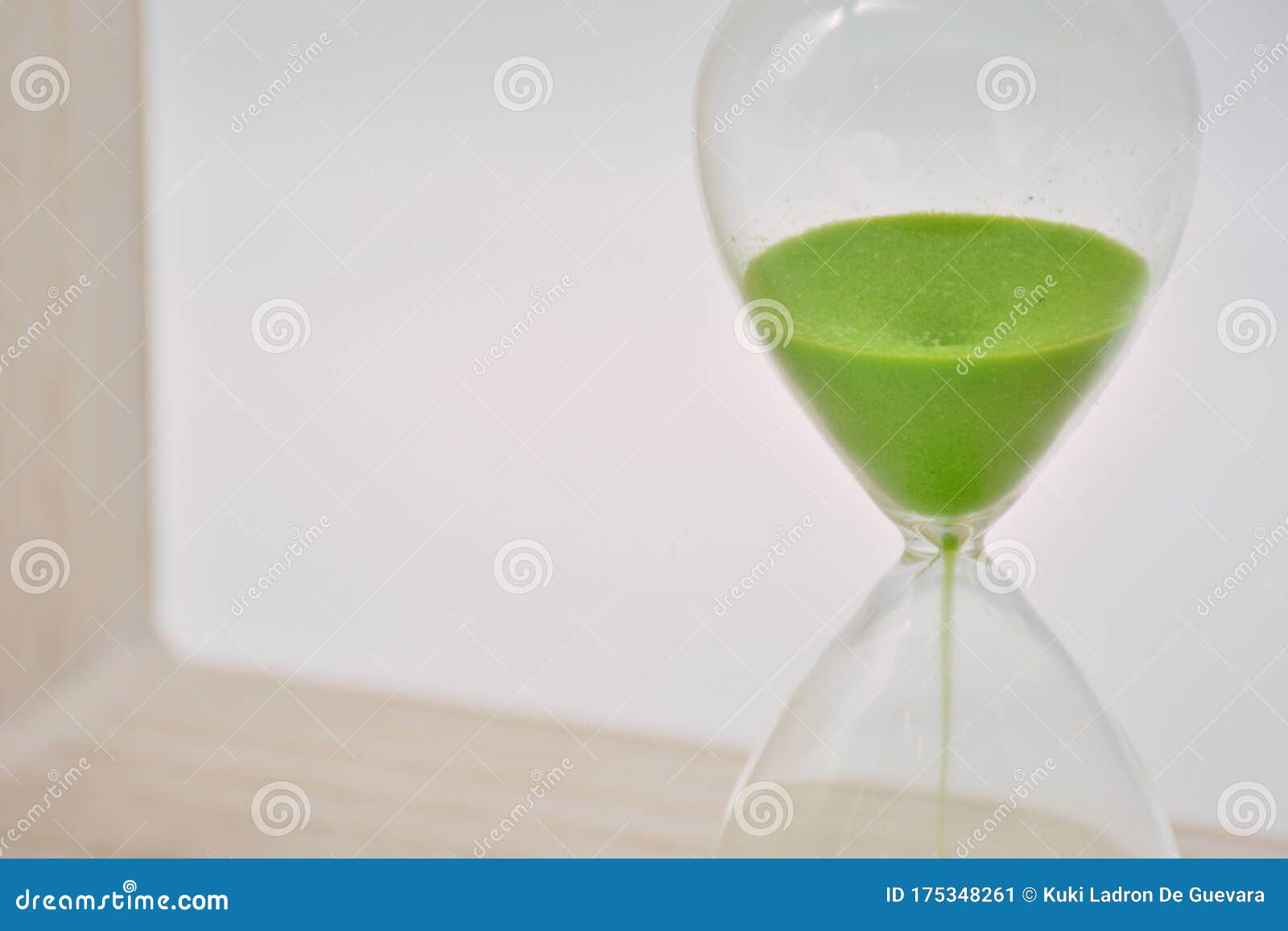 green hourglass, counting time