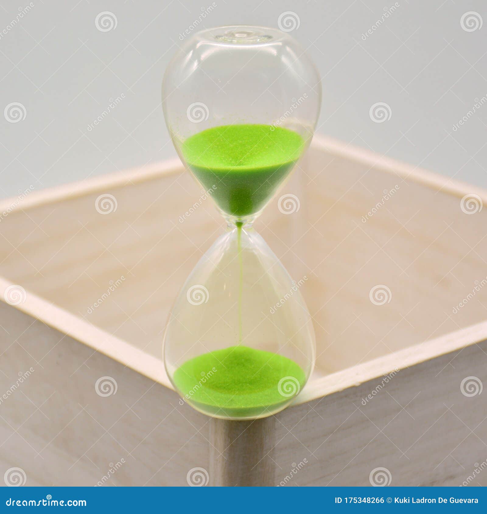 green hourglass, counting time