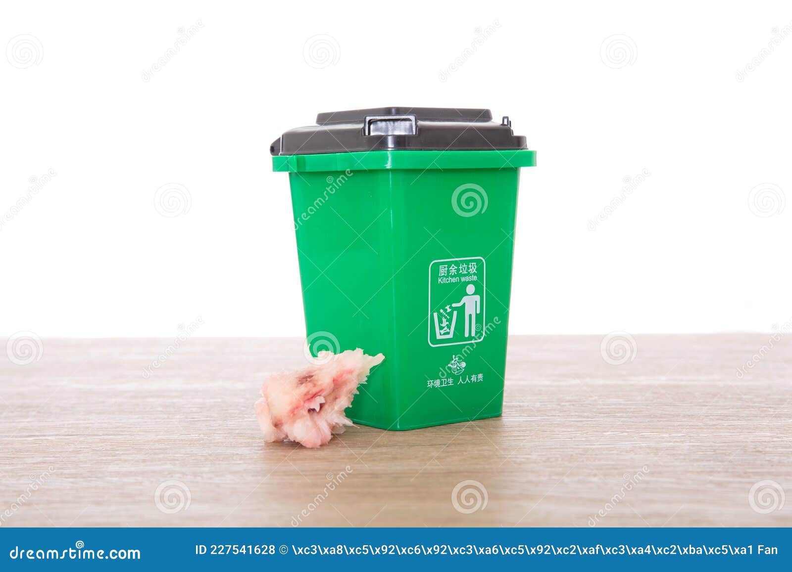 Green Kitchen Waste Trash Bin Model and Peach Core in Garbage
