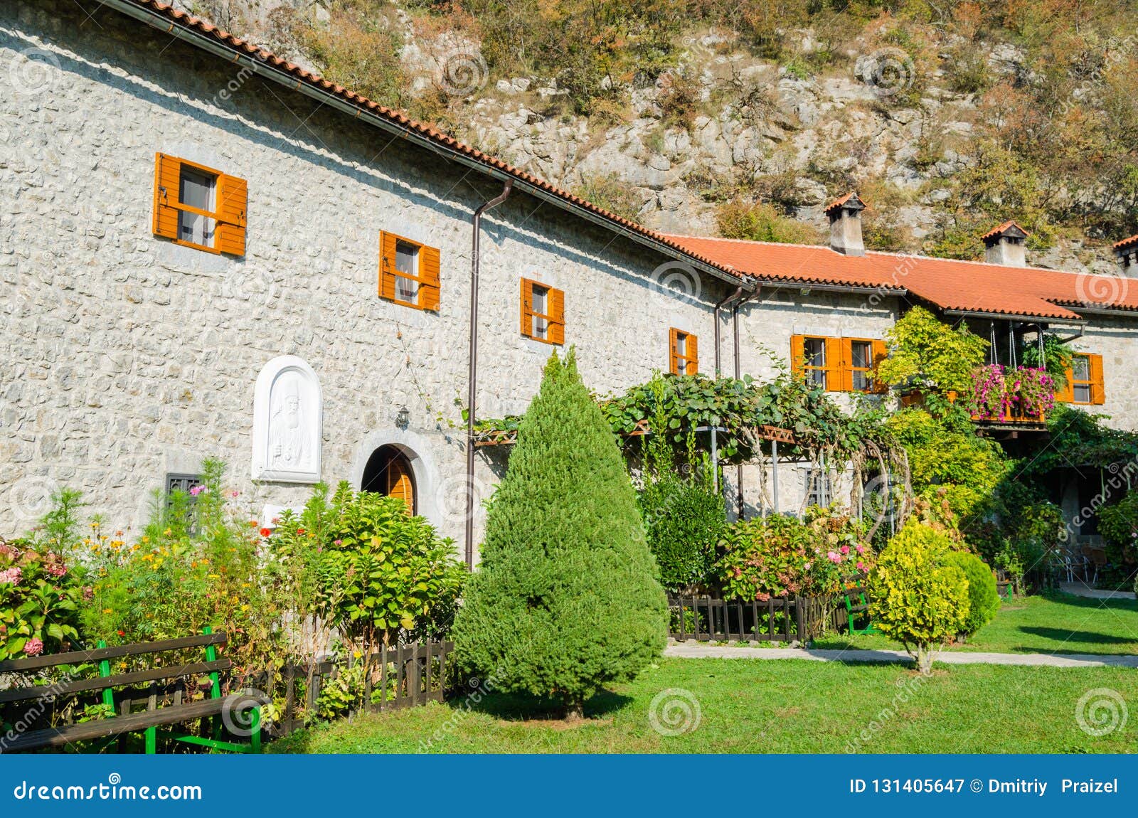 Green Landscaped with Flowers and Trees Courtyard in the Old Monastery