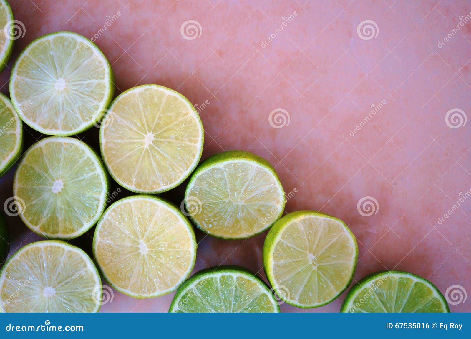 Green limes cut in half stock photo. Image of white, fruit 67535016