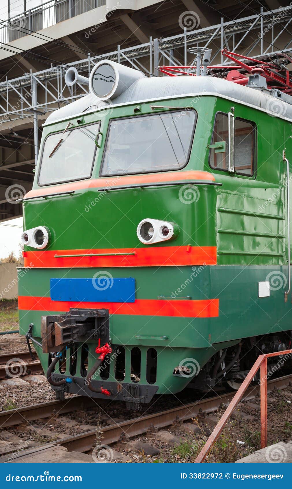 Green Locomotive with Red Stripes Stock Photo - Image of cabin, freight ...