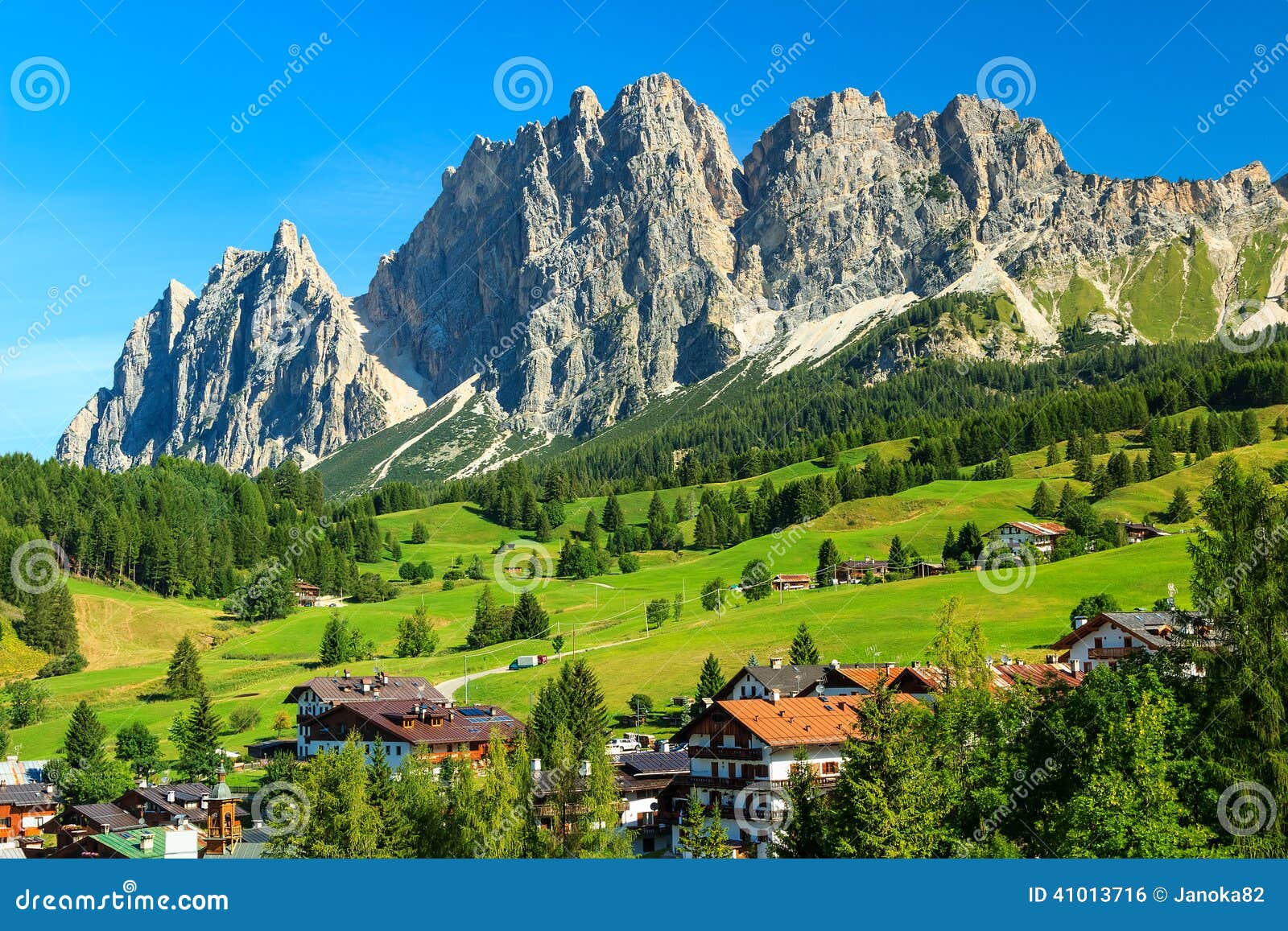 green meadows and high mountains above cortina d ampezzo,italy