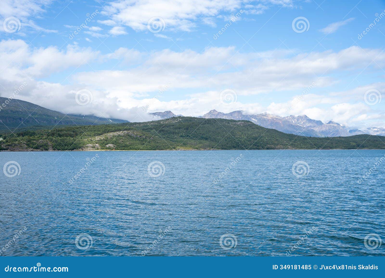 green mountains, fjord and blue sky in norwegian landscape in olderdalen, norway