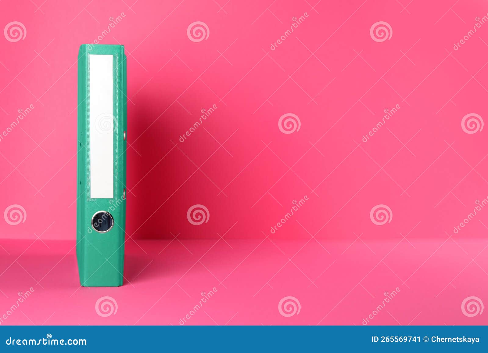 Green Office Folder on Pink Background, Space for Text Stock Image