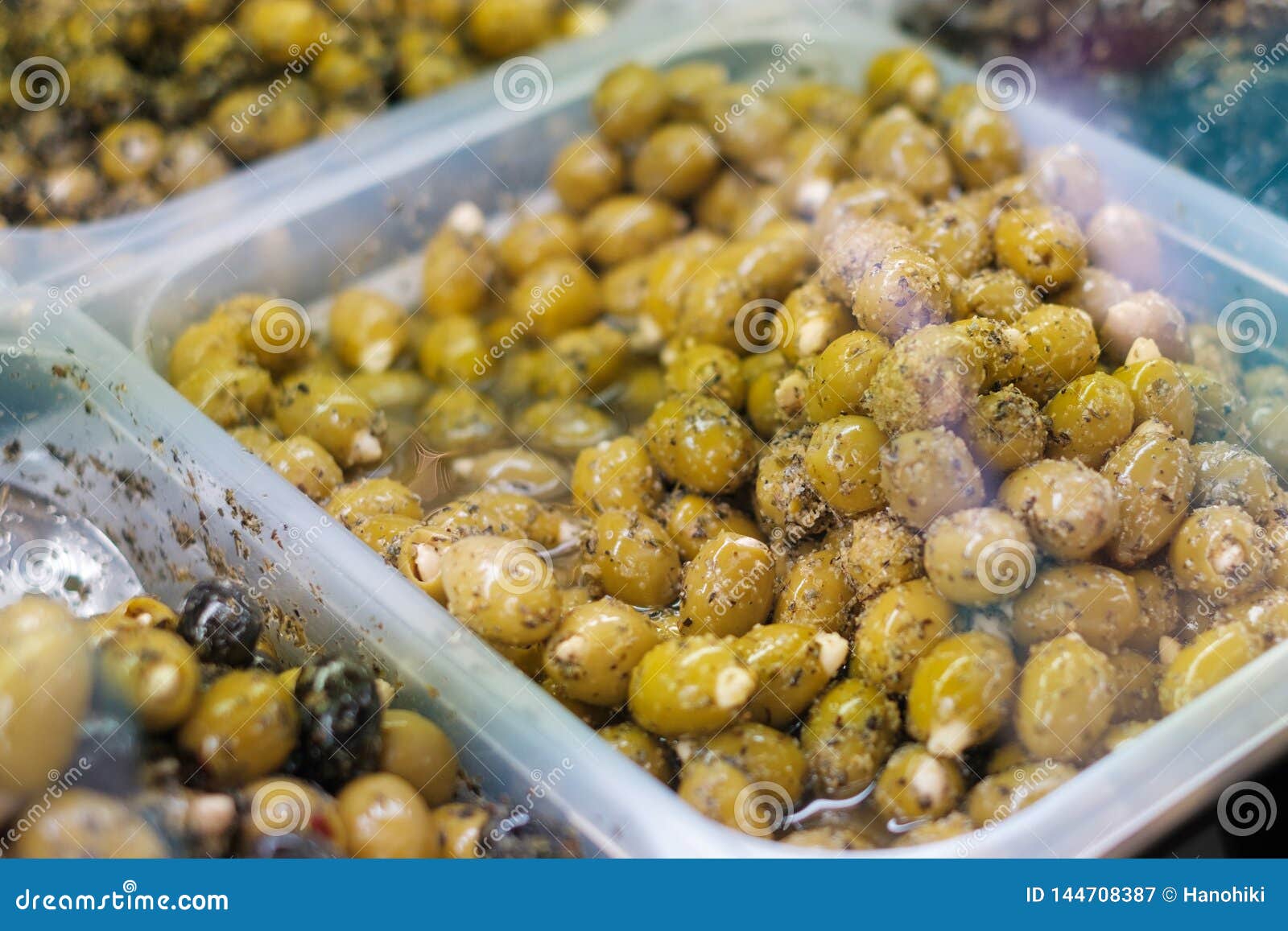Green Olives at Market Marinated Olives Stuffed with Almonds Stock