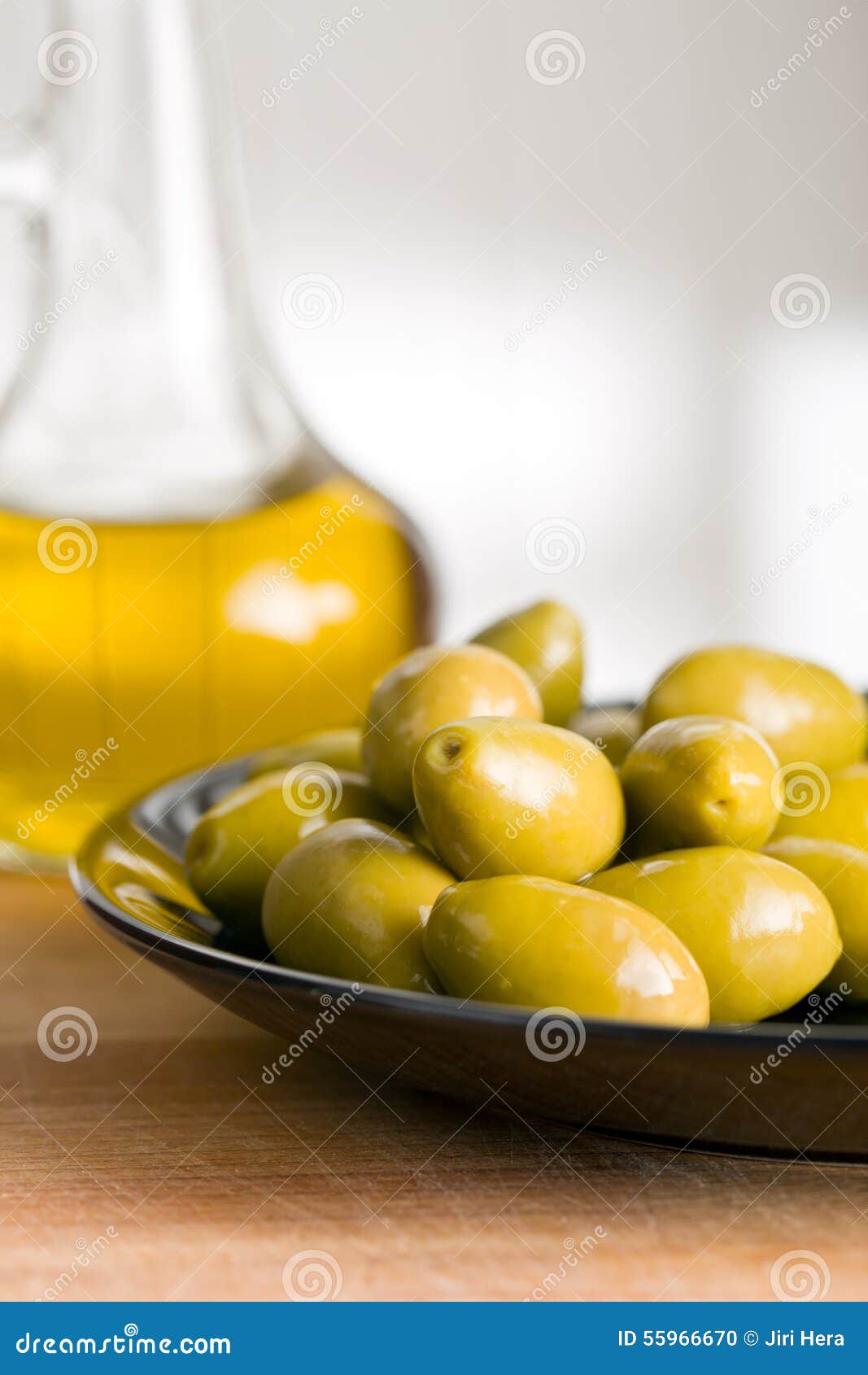 Green olives and olive oil stock photo. Image of cutout 55966670