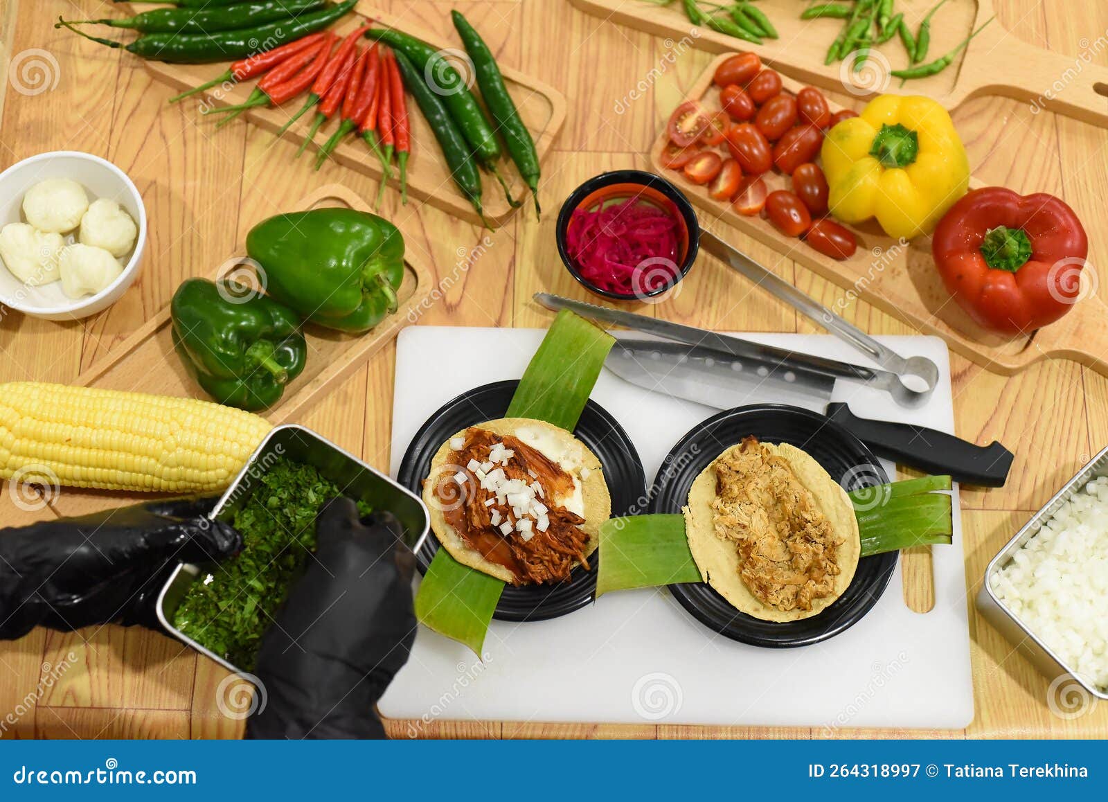 Green Onion in Hand for Preparing Tacos in a Mexican Restaurant Stock
