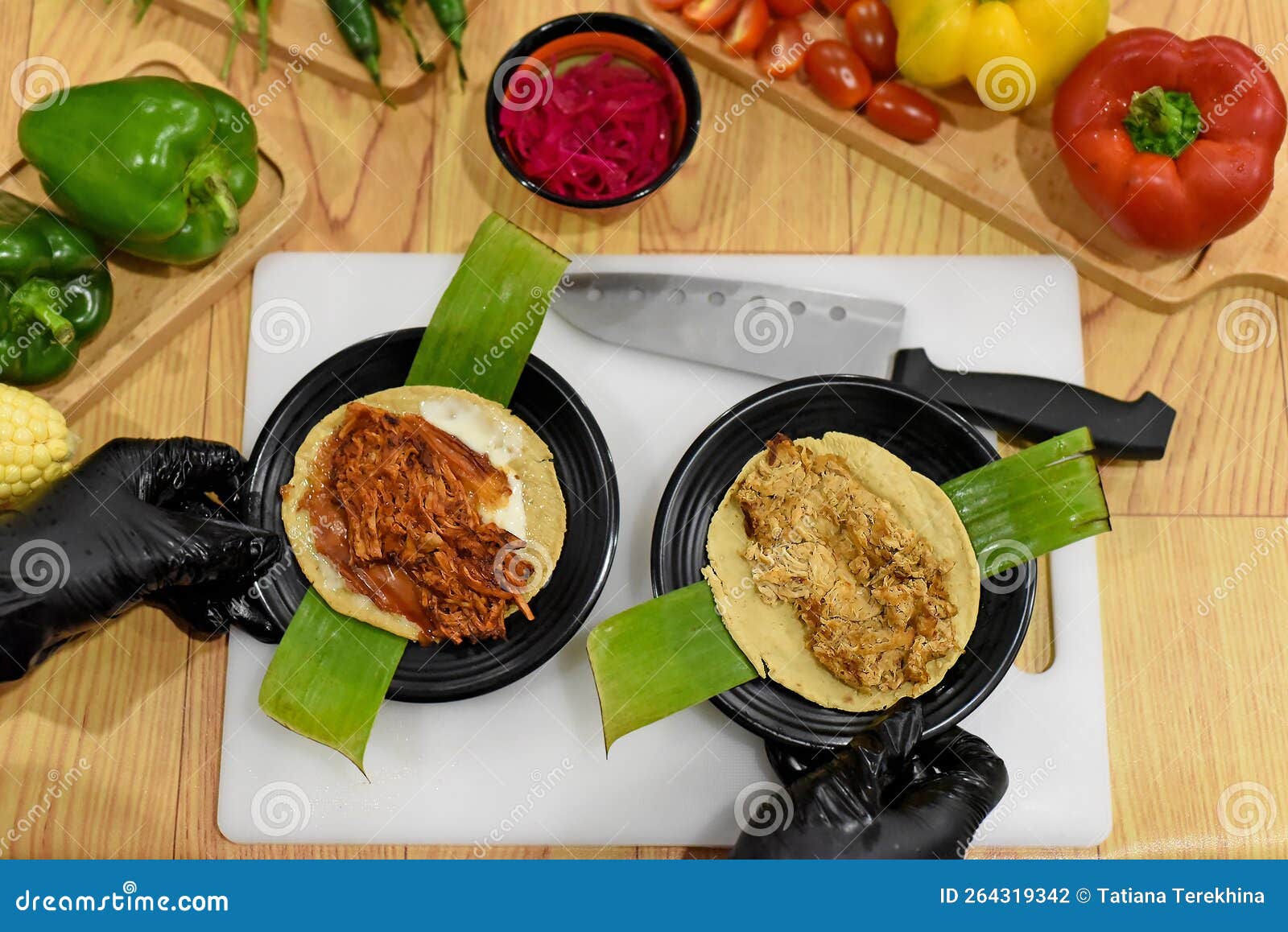 Green Onion in Hand for Preparing Tacos in a Mexican Restaurant Stock